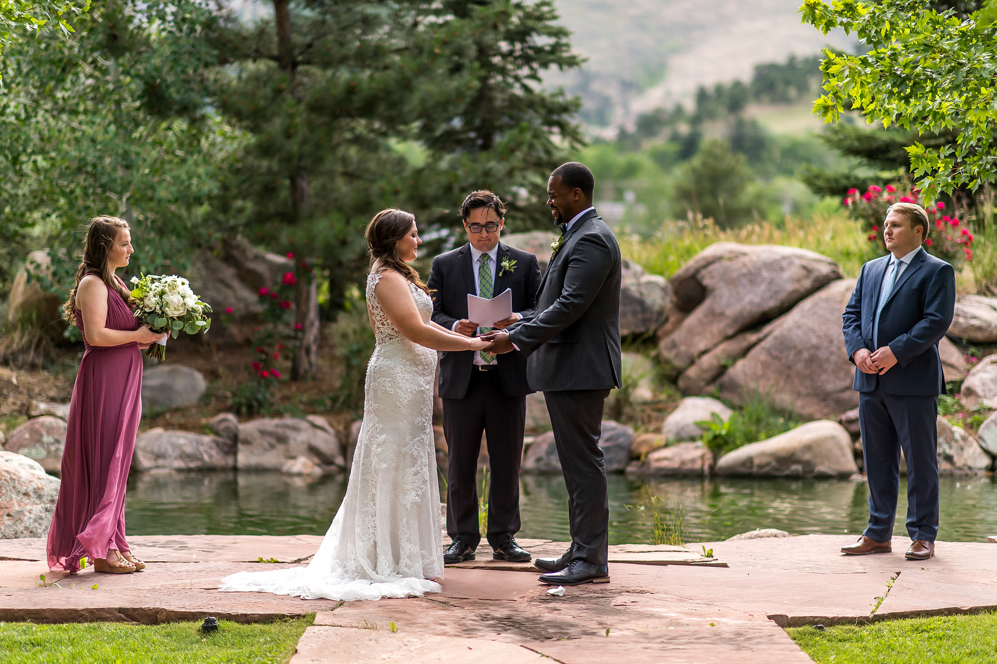 Bride and groom look at each other during a Greenbriar Inn wedding in Boulder, Colorado.