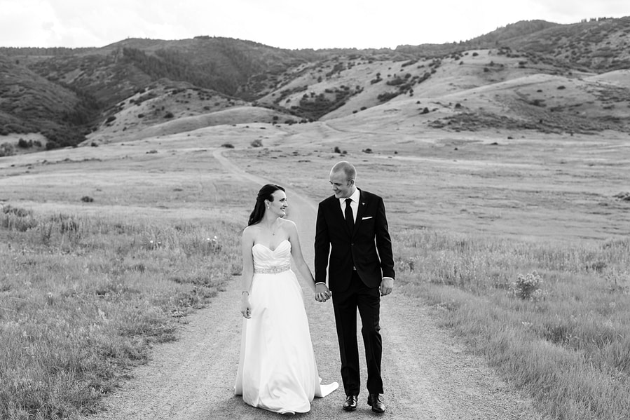 Kevin and Ellery walk during their Manor House Wedding on June 26, 2016, in Littleton, Colorado.