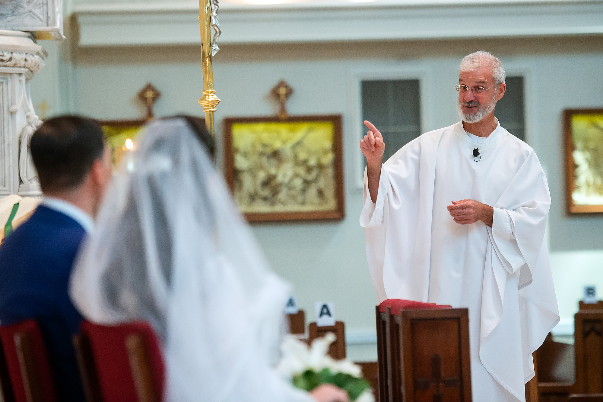 Fr. John Riley preaches during a wedding at the Cathedral Basilica of the Immaculate Conception in Denver, Colorado.