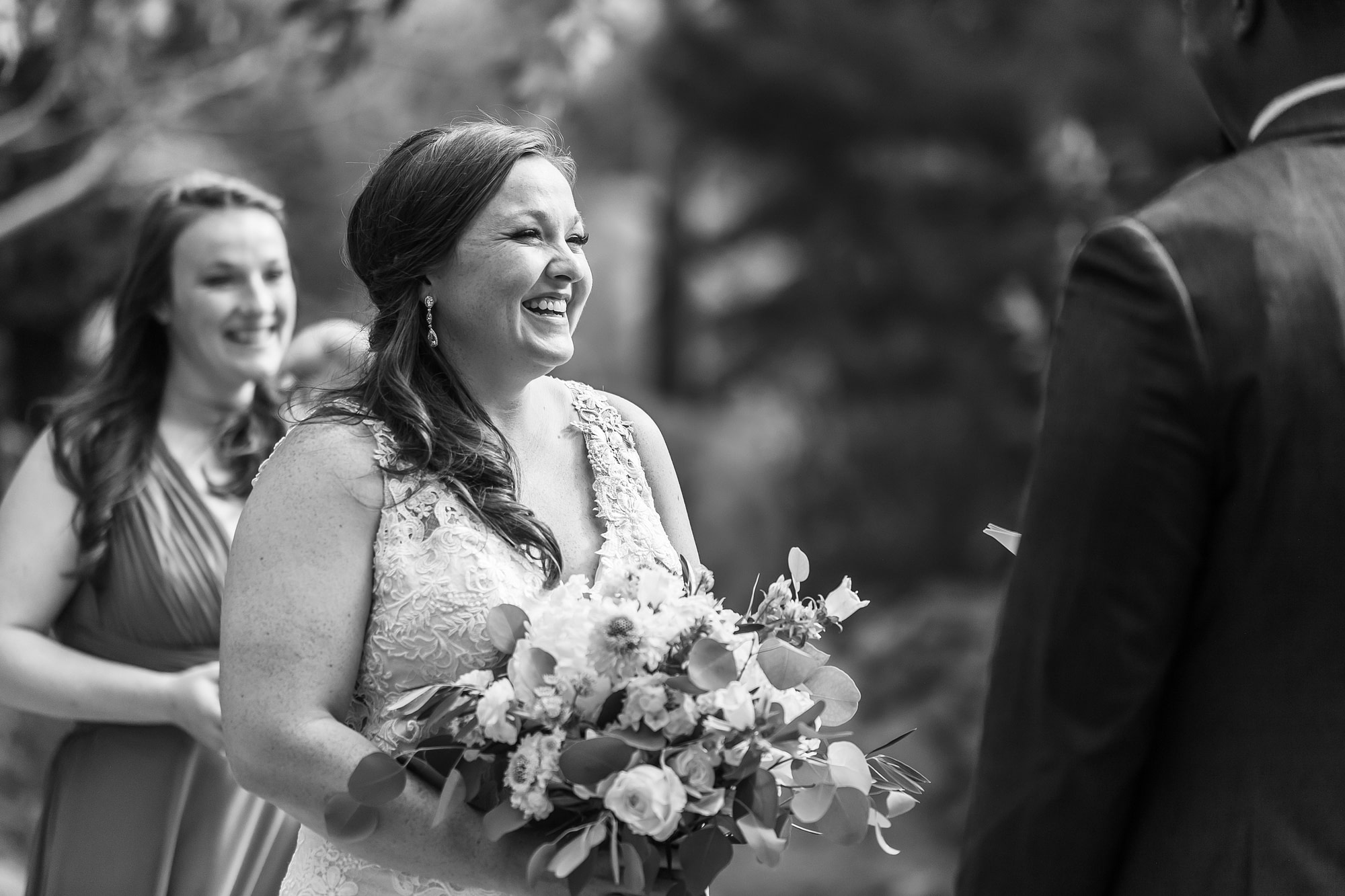 The bride smiles during a Greenbriar Inn wedding in Boulder, Colorado.