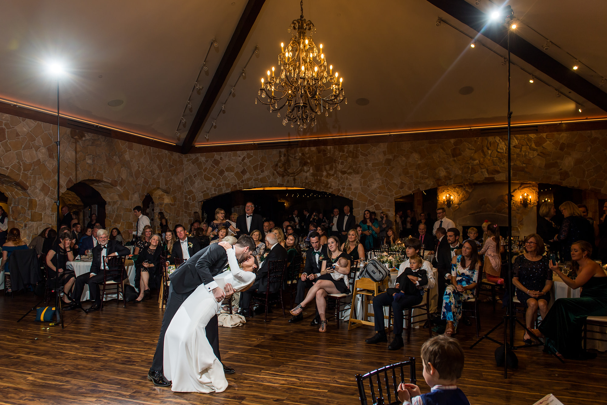 Bride and groom dance at Baldoria on the Water wedding venue in Lakewood, Colorado.