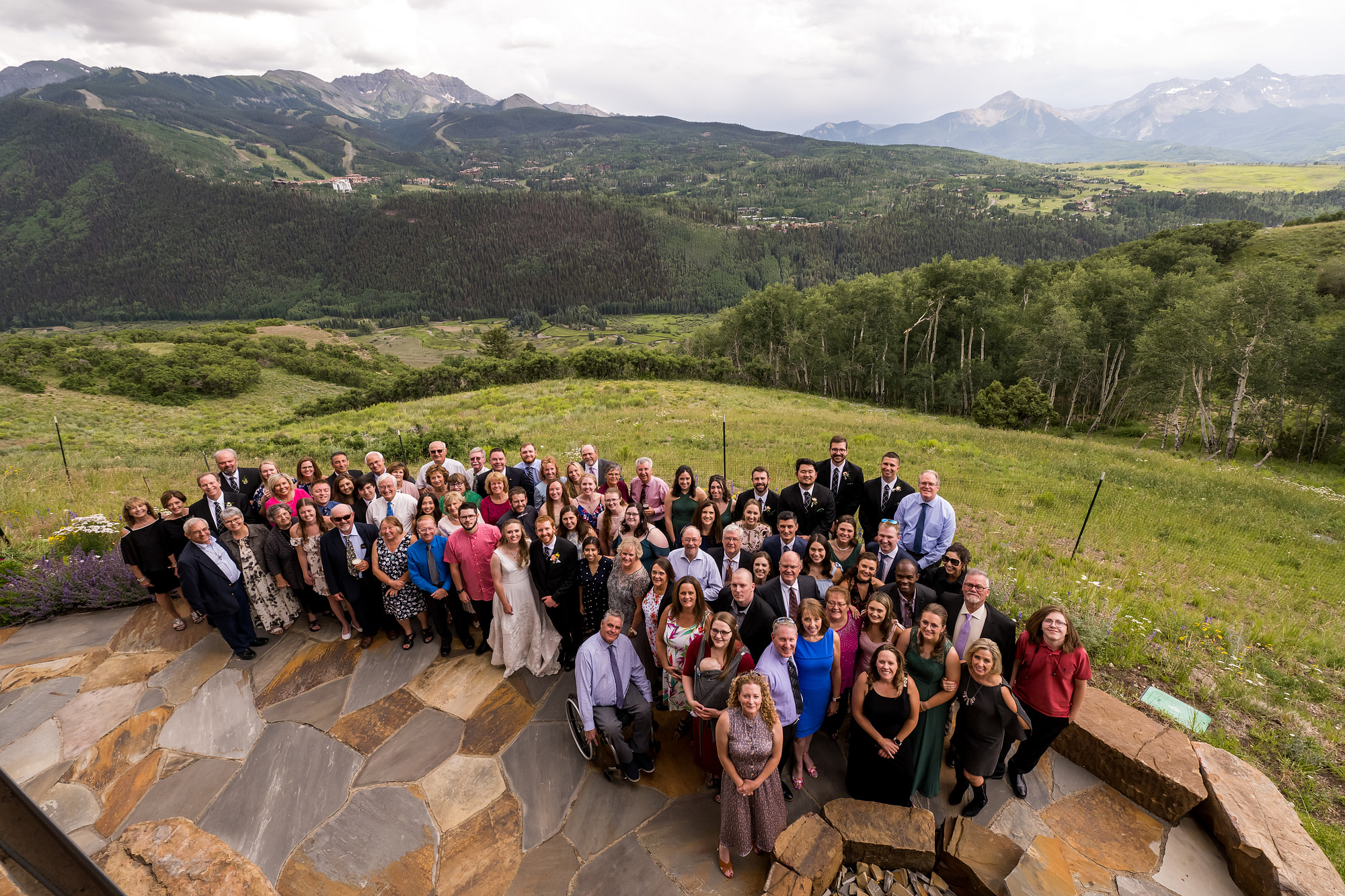 Guests pose for a photo during a wedding in Telluride, Colorado.