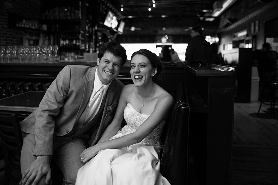 Anya Semenoff and Dan Petty sit at Cap City Tavern during their wedding
